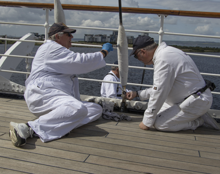 Yotties painting on an outside deck. 