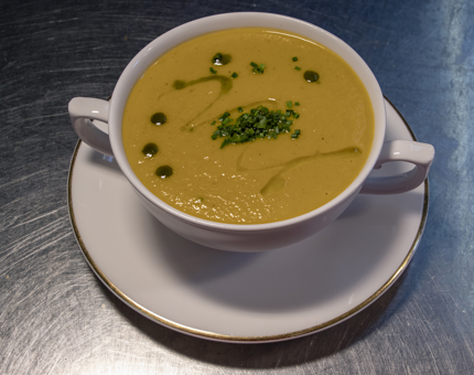 A bowl of carrot and sweet potato soup in the Galley.