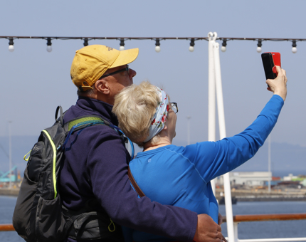 Two visitors take a selfie.