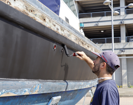 The FML is given an undercoat of paint by a Maintenance Team member.