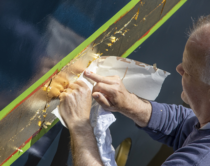 A close-up look of the gold leaf application. 