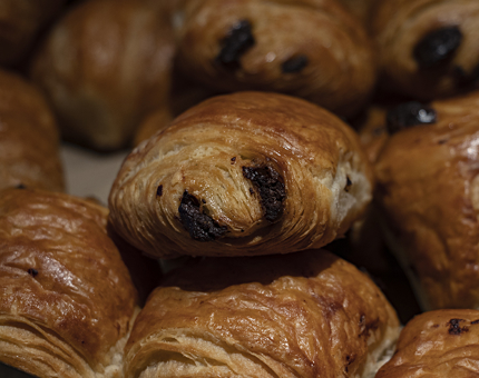 Pain au chocolats on a tray. 