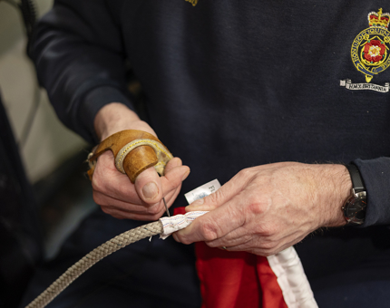 A closer look at flags being repaired. 