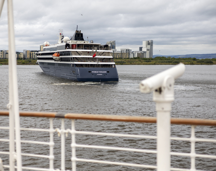 A view from the Verandah Deck of a cruise ship arriving into the port.