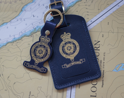 A navy blue gold-crested Britannia luggage tag and keyring. 