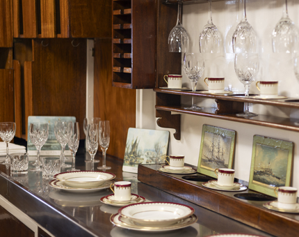 Chinaware and glass in the pantry. 